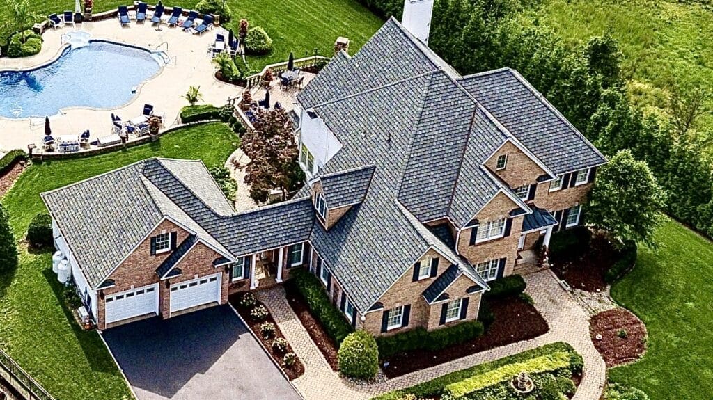 Monroe Nj State of the Art Roofing Company New Jersey Residential Roofing Arial View of Large House with Beautiful Roof Grand Manor Luxury Nj Roofing Installation