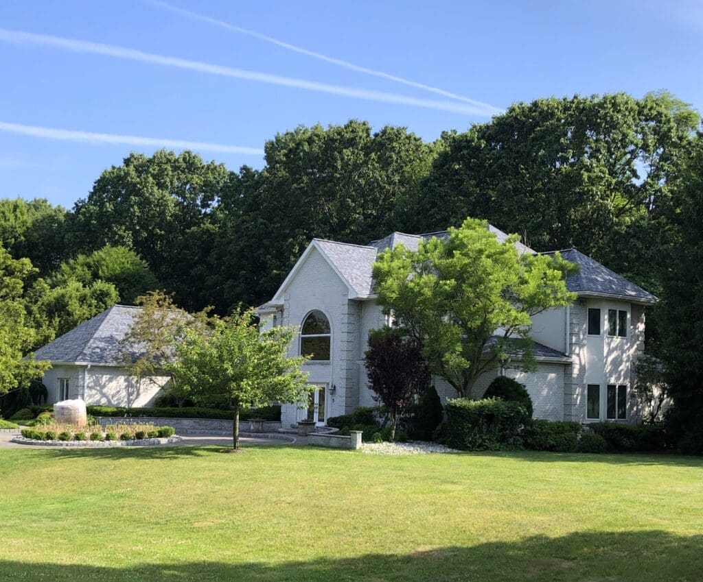 Roof Installation in Somerset New Jersey a Purple Letter B in Front of a Green Background