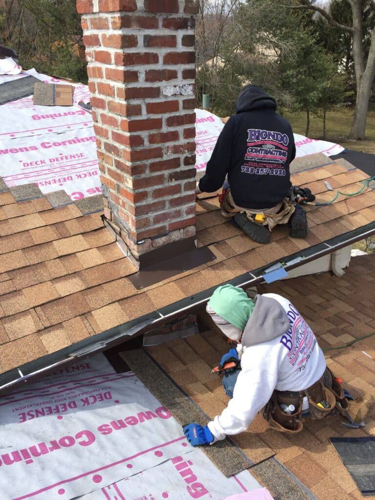 Professional Nj Chimney Flashing Application in Progress Brick Chimney on Roof with Flashing Flange