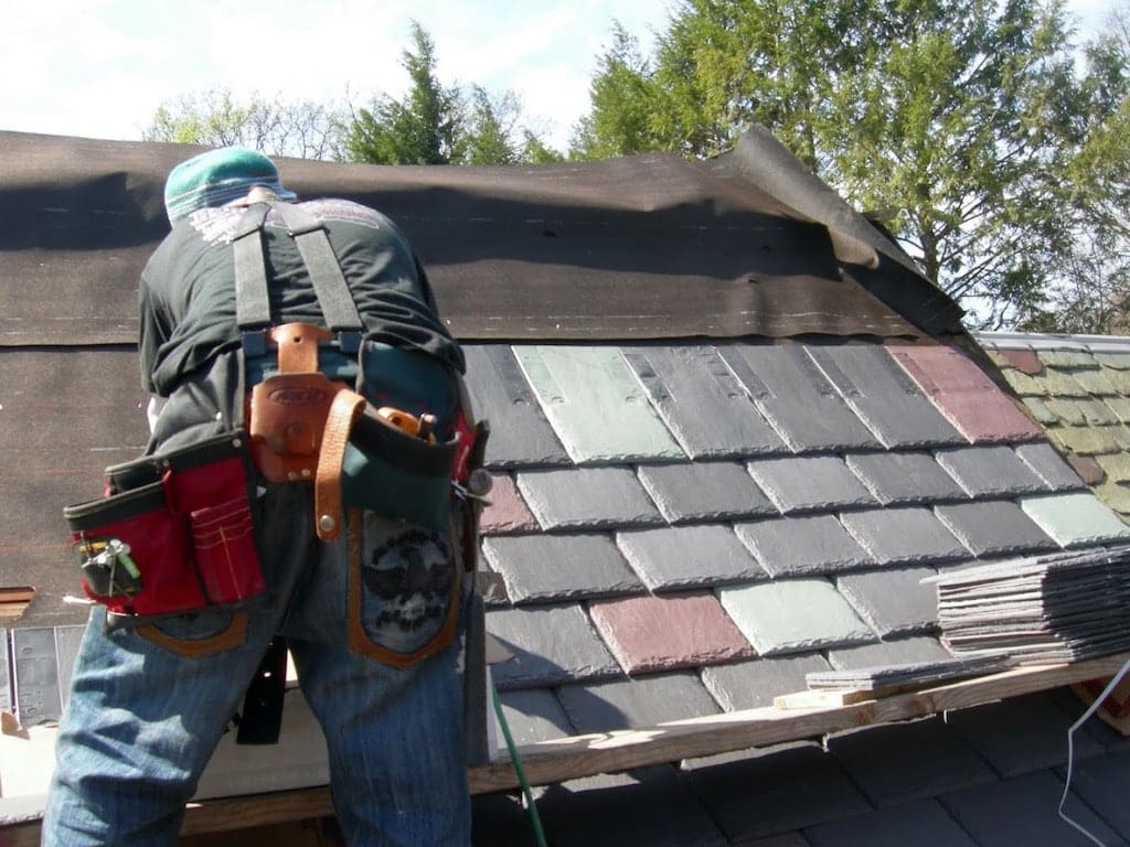 Princeton Nj Professional Roofing Services a Man with a Backpack and Tools on His Back Monroe Nj Roof Repairs