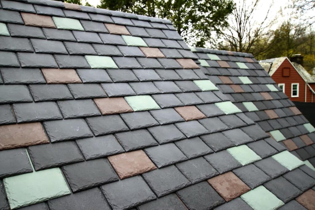 Composite Synthetic Slate Tile Roof Installation a Close Up of the Roof of a House Monroe Nj Roof Repairs