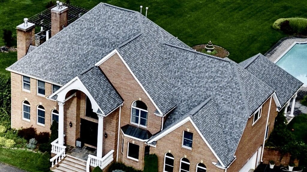 New Certified Duration Series Monroe Nj Roofing Installation Monroe Roofing Experts a House with a Large Roof That is Covered in Vibrant Color Shingles Monroe Nj Roofing Experts